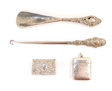 A small group of silverware, comprising a George V silver match case, with hammered body, Birmingham 1910, matchbox case, wit