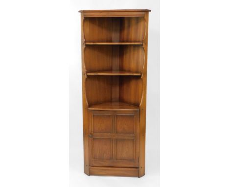 A light oak Ercol corner cabinet, with two shelf top above a panelled door, 184cm high, 74cm wide, and 56cm deep.