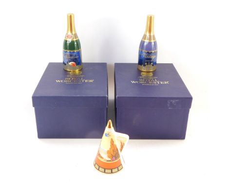 Three Royal Worcester candle snuffers, a Swallows at Dusk candle snuffer, a Millennium 2000AD bottle, and a Millennium 2001AD