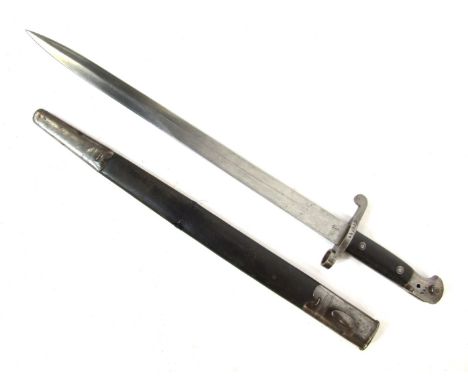 A Victorian bayonet, complete with scabbard, 62cm long. 