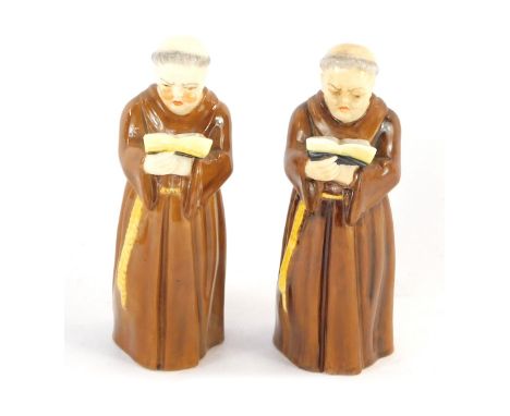 A pair of Royal Worcester Friar Tuck candle snuffers, 13cm high.