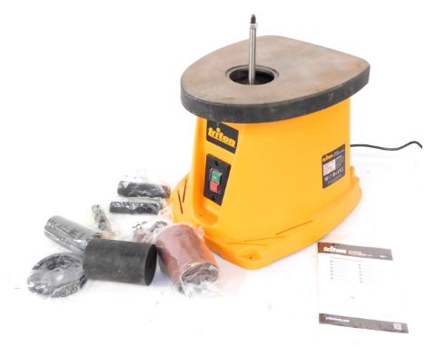 A Triton oscillating spindle sander, 450W, with additional sanding belts. 