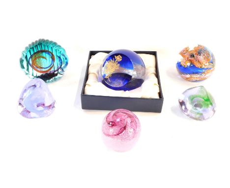 Six Caithness glass paperweights, comprising Pebble (x2), Glamis Rose limited edition, 65/500, Brimstone, Pixie, and Sea Pear