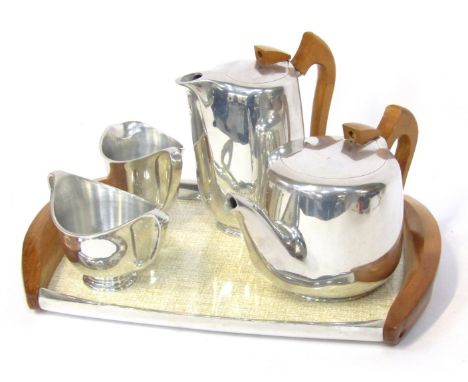 A mid century Picquot ware tea service, comprising tea pot, milk jug, sugar bowl, hot water pot and serving tray, 40cm wide.