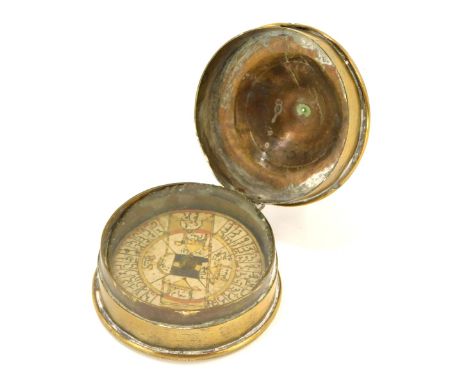 A Middle Eastern brass cased ship's compass, possibly Ottoman Empire, the dial painted with mosque domes and script, in a dom
