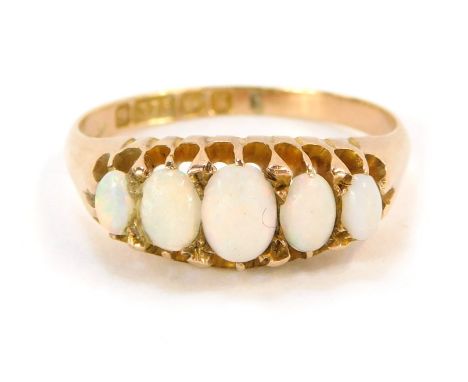 A 9ct gold opal dress ring, with five oval opals, in claw setting, ring size N½, 2.9g all in.