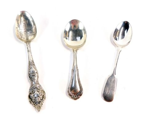 Three silver and plated spoons, comprising a fancy silver caddy spoon, Birmingham 1915, a Brooklyn Bridge New York commemorat