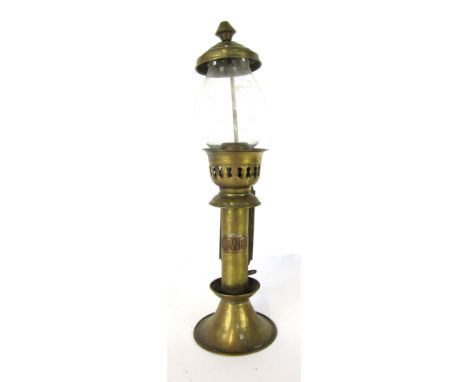 A GWR brass railway carriage oil lamp, with a glass shade top and applied brass plaque stamped GWR, 28cm high. 