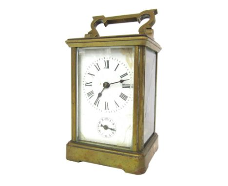 A French brass carriage timepiece, the rectangular white enamel face with black Roman numerals seconds dial and blue hands, w
