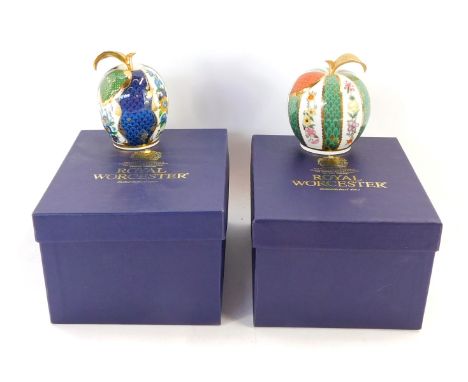 Two Royal Worcester candle snuffers, The Connoisseur Collection, Plum signed A J Wade, 3.9.2009., and Green Apple, boxed.
