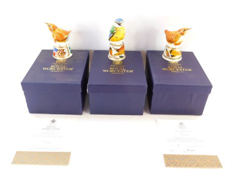 Three Royal Worcester candle snuffers, comprising Wren, No 11, Wren, No 320, and a Blue Tit, boxed.