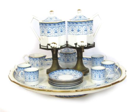 A Wedgwood Tete-a-Tete tea service, with a large rotating blue and white platter, five cups and saucers, milk jug and sugar b