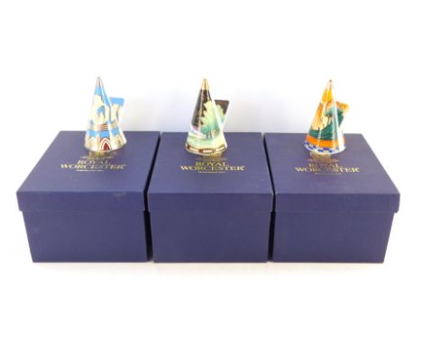 Three Royal Worcester Connoisseur Collection candle snuffers, comprising Blue Glade, Blue Lagoon, and Castles in the Air, box