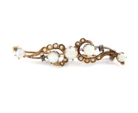 An opal and seed pearl bar brooch, of twist design set with three opals and set with seed pearls, on yellow metal single pin 