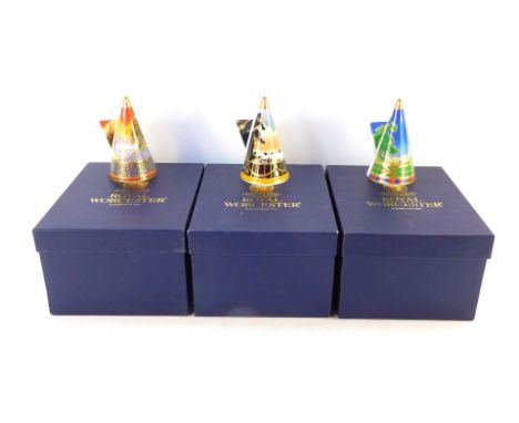 Three Royal Worcester candle snuffers, comprising Lazy Days, Morning River, and Sails at Sunset, boxed. 