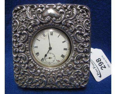 Silver repousse mounted pocket watch holder case with leather covering, containing nickel key wind open faced pocket watch. (