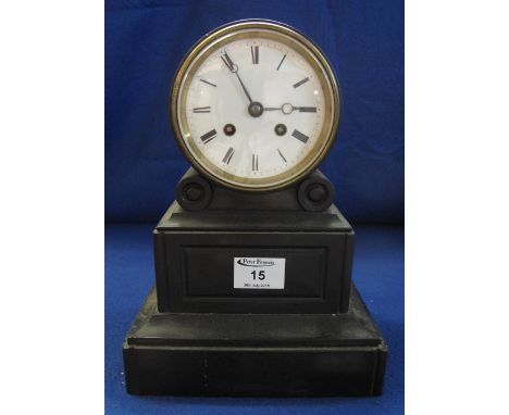 19th Century black slate two train drum head mantle clock with white enamel Roman face, and French brass drum movement.  Lack