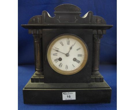 19th Century black slate architectural two train mantle clock with Roman white enamel face and brass drum movement striking o