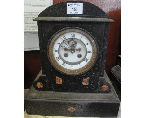 19th Century black slate and marble architectural two train marble clock with Roman white enamel face having exposed escapeme