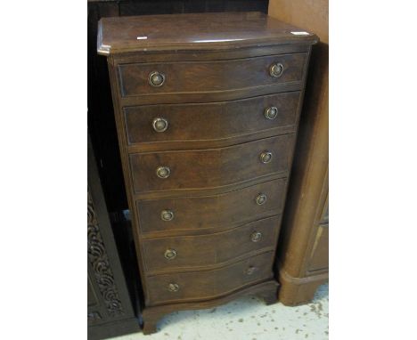 Reproduction walnut narrow serpentine chest of six drawers standing on bracket feet. (B.P. 24% incl. VAT)