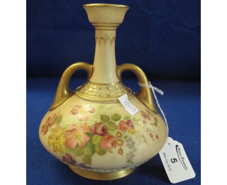 Royal Worcester porcelain blush ivory baluster shaped two handled vase, overall decorated with painted and gilded flowers and