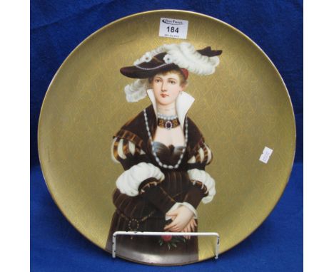 19th Century continental porcelain plaque painted with a portrait of a regal lady in feathered hat on a gilded background. 35