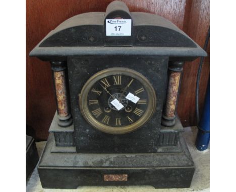 19th Century black slate and marble two train architectural mantle clock with black gilded Roman face and brass movement.  La