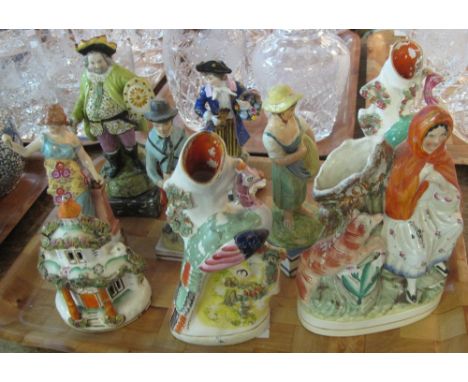 Tray of 19th Century Staffordshire and continental figurines to include: Falstaff, spill vase figure groups etc. (9)(B.P. 24%