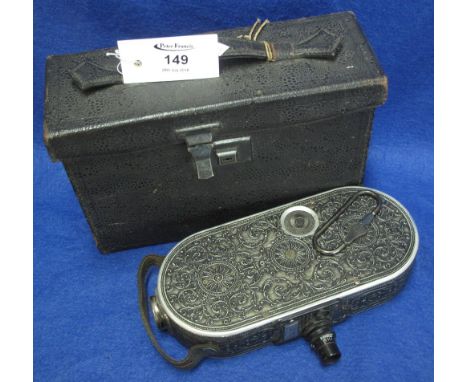Unusual Bell and Howell Filmo no. 75 model automatic cine-camera, the case decorated with overall scrollwork and having origi