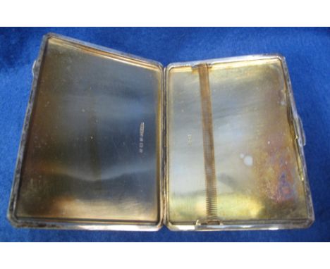 A silver engine turned cigarette case by R.N.H & Co. Birmingham.(B.P. 24% incl. VAT)