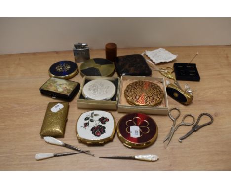 A selection of vintage compacts including Stratton, sewing scissors, carved Japanese cigarette case and Ronson lighter etc.