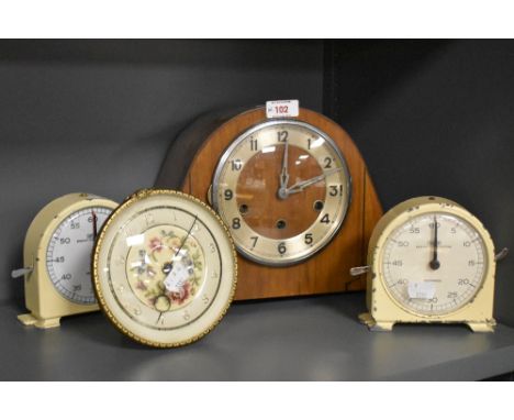 A selection of vintage clocks, including two Smiths mid century tin alarm clocks and Art Deco mantel clock.