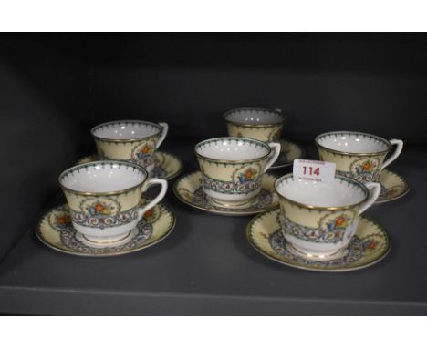 Six circa 1940s Royal Worcester 'Chalons' cups and saucers, having cream ground with floral patterns and motifs.