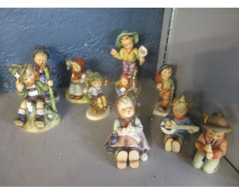 A group of nine Goebel Hummel figurines to include Serenade, one A/F, and a Fredal figurine 