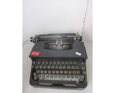A vintage 'Silent' typewriter in black, no case 