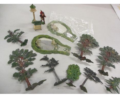 A group of vintage lead toy farm pieces to include two duck ponds and trees housed in a pink fabric boxLocation: 2.4 