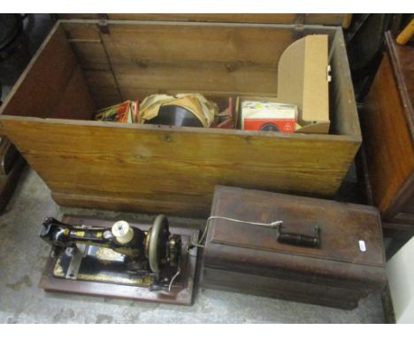 A mixed lot to include singles records, a Jones sewing machine and a pine twin handled trunk 