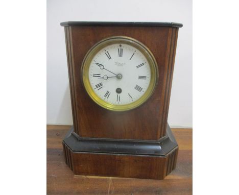 A late 19th century walnut and ebonized mantel clock with a French movementLocation: 1.2 