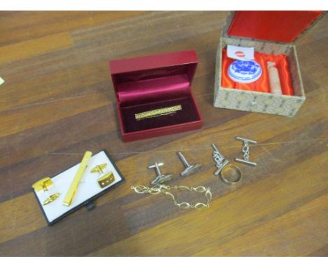 A selection of 9ct gold, and costume jewellery to include a gold wedding band 2.8g, a gold bracelet 1.8g, cufflinks and tie c