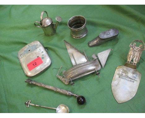 A quantity of small white metal items to include a snuff box in the form of a shoeLocation: Porter 