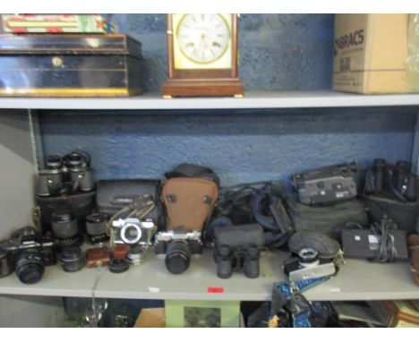 A group of cameras, binoculars, lens and camera accessories to include a Nikon AF K-401S cameraLocation: 3.2 