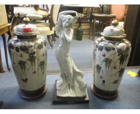 A pair of late 20th century Satsuma table lamp bases with detachable lids, decorated with flowers, on wooden bases 46cm h, an