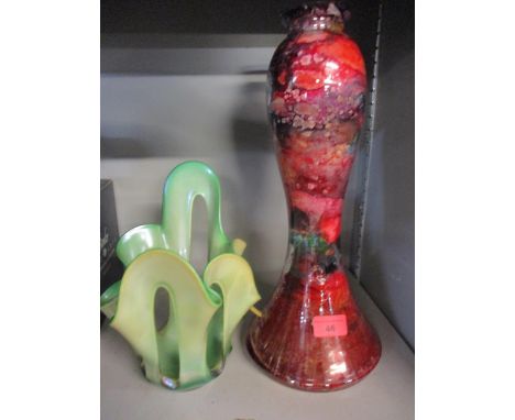 An Art glass table lamp, signature indistinct, in a red and black mottled effect A/F (requires re-wiring, small chip to rim) 