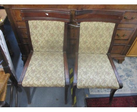 A pair of William IV mahogany framed bar back chairs, circa 1830s, with upholstered backing and drop in seat, each chair stam