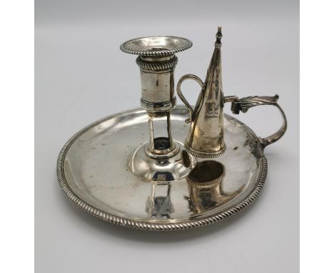 A George III silver chamber stick  by Peter & Ann Bateman, London 1795, with gadrooned borders and scroll handle and an assoc