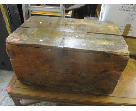 A vintage trunk having wrought iron hinges and rope handles 40cm h x 76cm w 