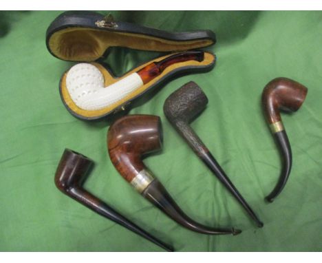 A Peterson's of Dublin, silver collared pipe, a Medico Varsity pipe, an Old Bond pipe and two others, including a pipe caseLo