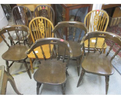 Mixed chairs to include beech stick back chairs and four Captain style chairs 