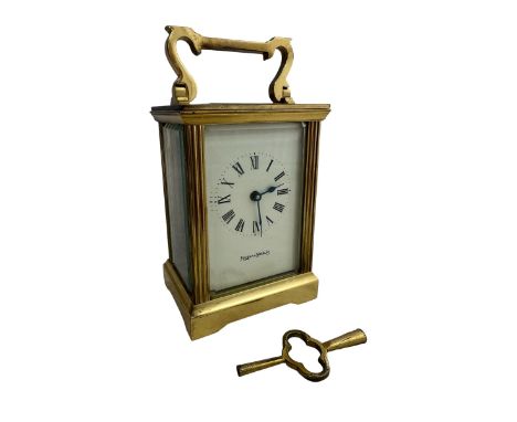 A brass Mappin &amp; Webb carriage clock,15cm high. Clock is running at time of cataloguing. 