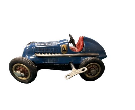 Schuco Studio Racing Car working clockwork with key steerable car, blue, race no. 4, with Driving School instruction leaflet,